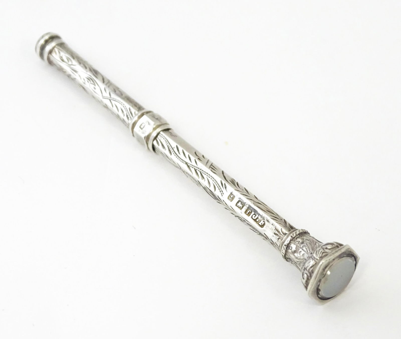 A silver propelling pencil hallmarked Birmingham 1905, maker James Fenton. Approx. 3 1/4" long (1 of 5)