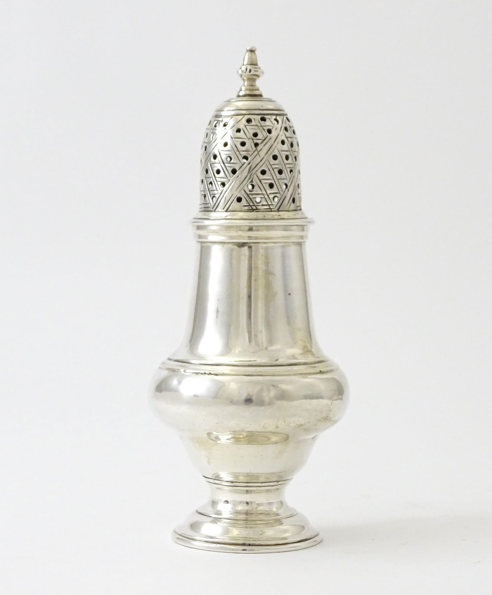 A Geo III silver sugar caster hallmarked London 1766, maker Jabez Daniell & James Mince. Approx. 4 (1 of 6)
