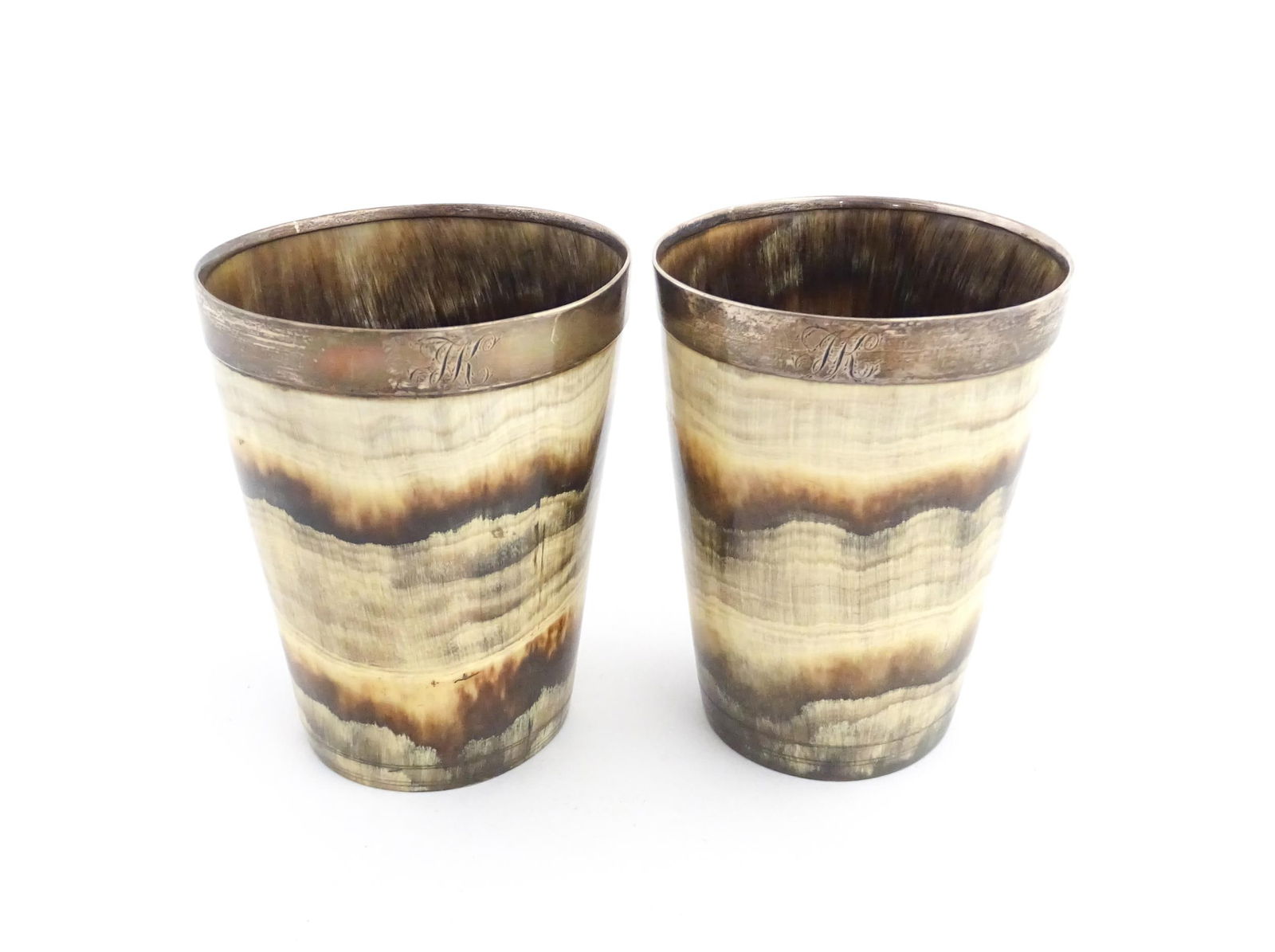 A pair of 19thC Scottish horn beakers with white metal rims. Approx. 3 3/4" high (2) (1 of 7)