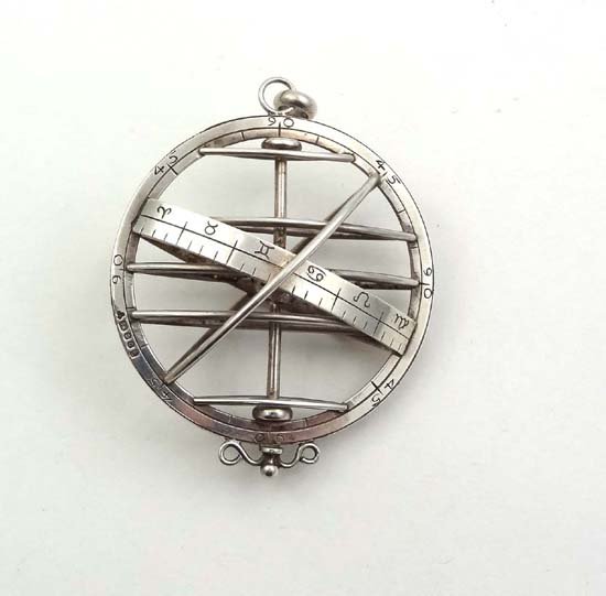 A HM silver pendant Armillary sphere? / Orrery ? L: A HM silver pendant Armillary sphere? / Orrery ? London 1977 with silver Jubilee mark. 2 1/2" high