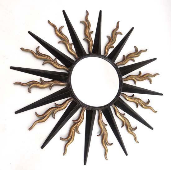A late 20thC wall mounted sunburst circular mirror 35 1: A late 20thC wall mounted sunburst circular mirror 35 1/2" diameter