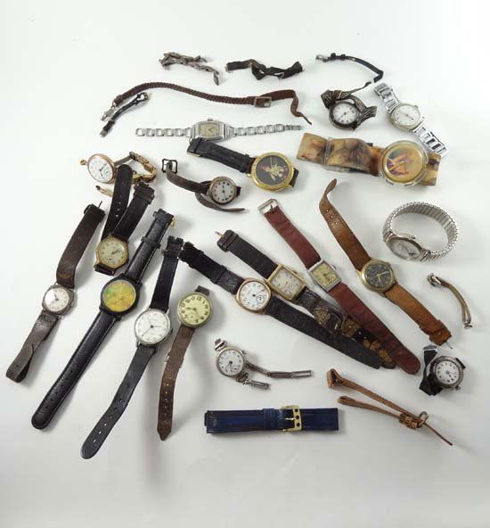 A quantity of assorted wrist watches , straps etc some: A quantity of assorted wrist watches , straps etc some silver cased, examples including Ingersol , Swatch , Newhaven etc