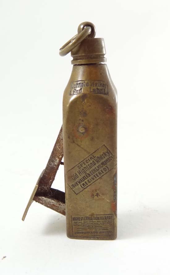 A Novelty cigar cutter advertising Johnnie Walker Red L: A Novelty cigar cutter advertising Johnnie Walker Red Label Special Old Highland Whiskey 2 1/4" high