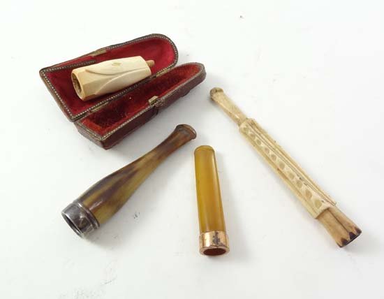 A 9ct gold cigarette mouthpiece , a HM silver and horn: A 9ct gold cigarette mouthpiece , a HM silver and horn cigar mouthpiece, meerschaum cased mouthpiece and a bone cigarette holder (4)