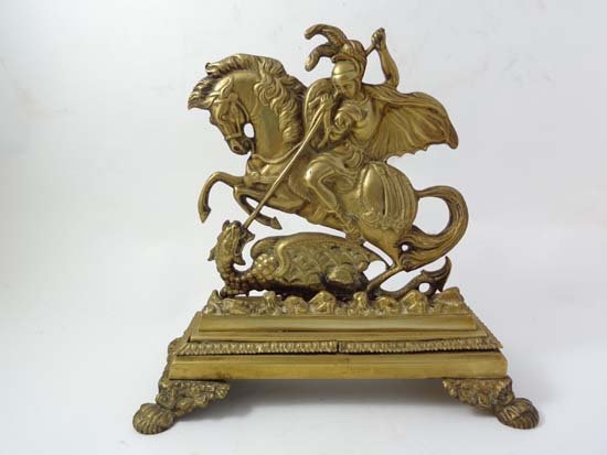 A superb 19thC doorstop, with cast brass image of St Ge: A superb 19thC doorstop, with cast brass image of St George on horseback and a the Dragon. Approx 10 3/4" high