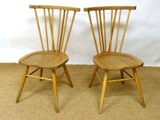 Vintage Retro : a pair of British Ercol High Comb back : Vintage Retro : a pair of British Ercol High Comb back Windsor chairs with shaped seats and back supports, not unlike Windsor Fireside Chair ( 669 ) and Rocking Chair ( 673 ) circa 1970. 36" high