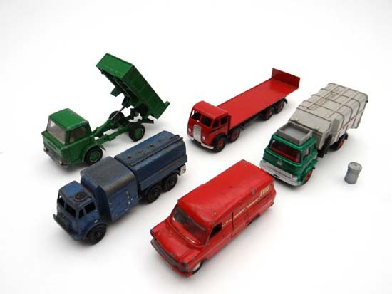 A selection of Dinky toys to include ; Bedford refuse w: A selection of Dinky toys to include ; Bedford refuse wagon with one rubbish bin, pressure refueller 642, Foden low loader, Ford transit van, Avis truck rental, Ford D800 hydraulic flat bed.