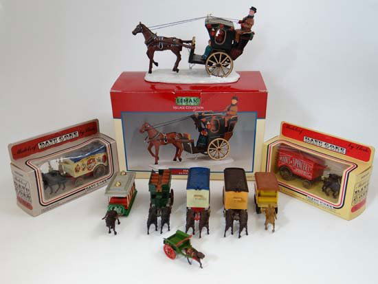 A quantity of diecast horse drawn vehicles mostly from : A quantity of diecast horse drawn vehicles mostly from the Days Gone series by Lledo including Lipton's Teas, Big Top Circus etc. Some boxed. (9)