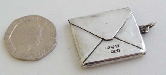 A HM silver stamp case of envelope form Chester 1913 ma: A HM silver stamp case of envelope form Chester 1913 maker Albert Ernest Jenkins 1" wide