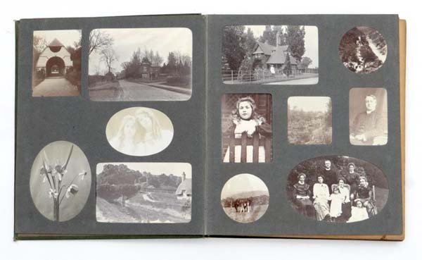 Photograph album : A large cloth bound photograph album: Photograph album : A large cloth bound photograph album 'Sunny Memories' containing a number of Edwardian photographs of people and places around the area of Tring including the Ashridge Estate.