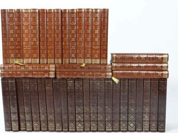 A large quantity of books comprising a collection of no: A large quantity of books comprising a collection of novels by Robert Louis Stevenson including Treasure Island, and a collection by Sir Walter Scott including Ivanhoe. All published by Heron Books c1