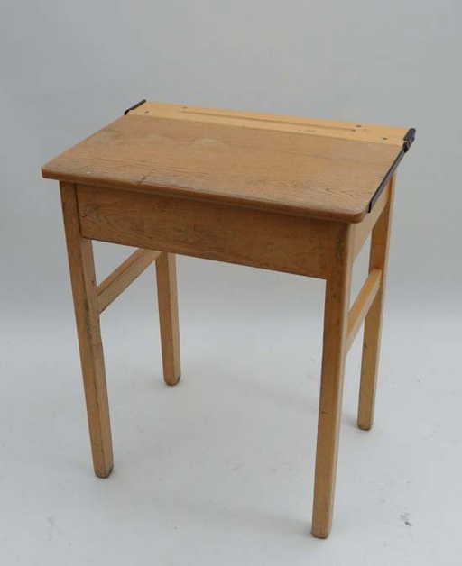 A Vintage White Wood School Desk With Lift Up Lid And