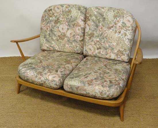 Vintage Retro : Ercol ( brown on gold) Windsor settee: Vintage Retro : Ercol ( brown on gold) Windsor settee with blonde wood stick back construction with twin back supports and open arms. approximately 48" wide