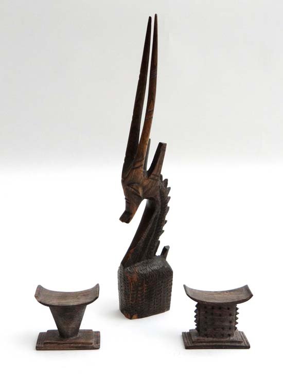 African Native Tribal : a Mali carved wooden one piece: African Native Tribal : a Mali carved wooden one piece Deer head in the Tyewara manner together with two hardwood carved miniature throne stools. The deer 12 1/4" high £25 - 35