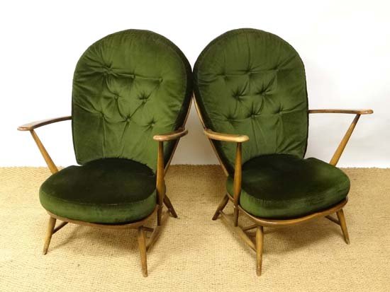 Vintage Retro : Ercol a pair of Windsor Armchairs with: Vintage Retro : Ercol a pair of Windsor Armchairs with Fleur de Lys motif ( no 233 ) and loose cushions with covers. £90 - 140