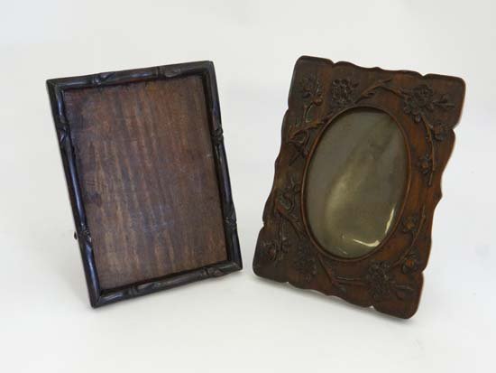 A pair of Chinese Rosewood easel picture frames both: A pair of Chinese Rosewood easel picture frames both approx 7 3/4" high £25 - 35
