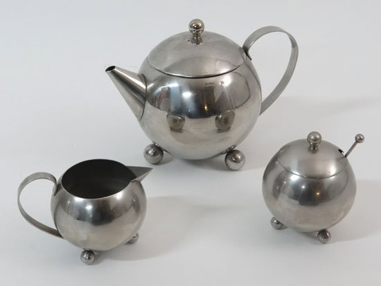 Vintage Retro : a stainless steel spherical formed 3: Vintage Retro : a stainless steel spherical formed 3 piece tea set comprising of a teapot, milk jug and lidded sugar bowl with spoon.