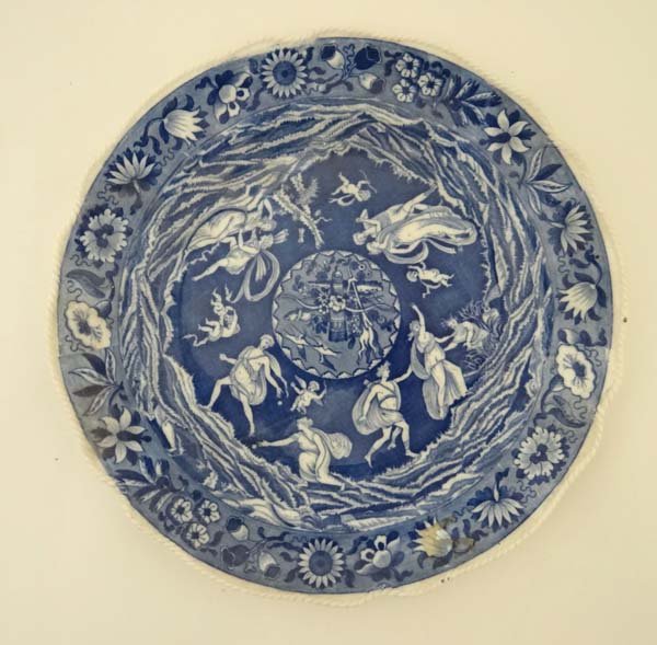 An early 20thC Copeland Spode blue and white transfer: An early 20thC Copeland Spode blue and white transfer printed plate decorated in Love Chase pattern, depicting Cupid cherubs and classical couples. Diameter 11" £25 - 35