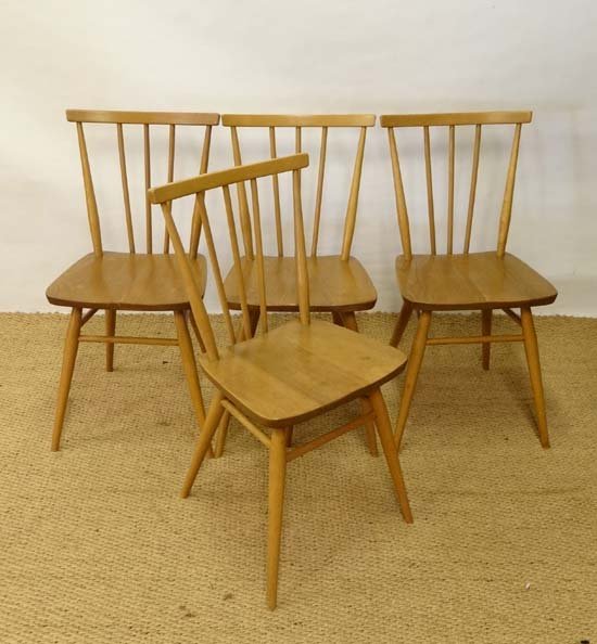Vintage Retro : a set of 4 Ercol blue (1960) Blonde: Vintage Retro : a set of 4 Ercol blue (1960) Blonde Windsor Kitchen Chairs ( no 391) with impressed marks under and original stickers. 31" high Please Note - Prospective purchasers must satisfy themse