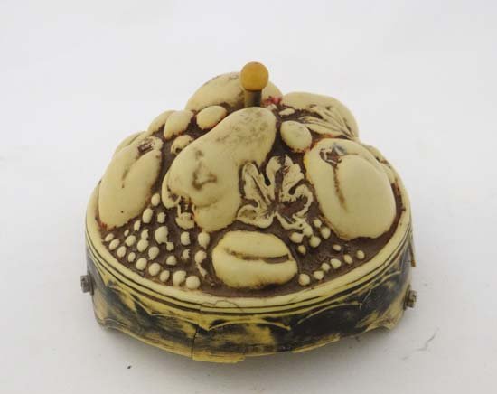 A 1950's German clock work shop bell formed as a: A 1950's German clock work shop bell formed as a circular domed collection of assorted fruit with button to top 3 5/8" diameter Please Note - Prospective purchasers must satisfy themselves as to the c