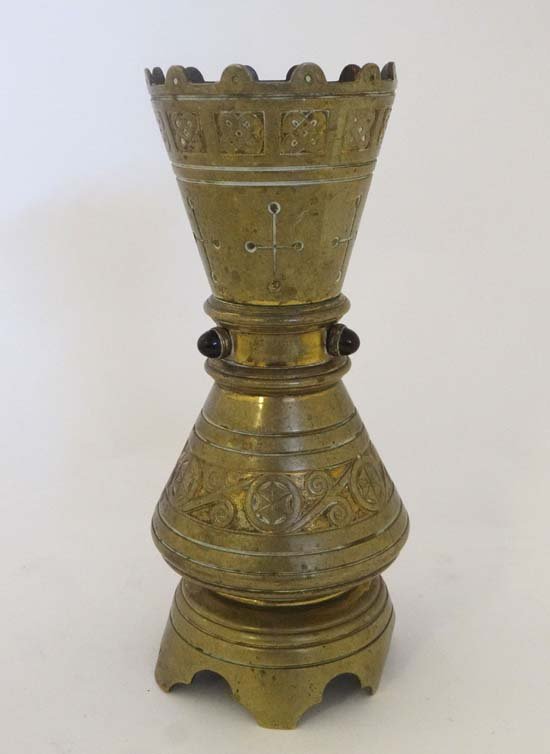 A 19thC 1865 Dr Christopher Dresser designed ? gilt: A 19thC 1865 Dr Christopher Dresser designed ? gilt brass ( traces of ) ecclesiastical vase with amethyst, quartz and ruby glass cabachons 9" high Please Note - Prospective purchasers must satisfy the
