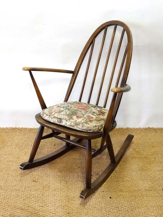 Vintage Retro : Ercol , a Windsor Fireside Quaker: Vintage Retro : Ercol , a Windsor Fireside Quaker rocking chair, no 428. bears ink stamp for 49 under, circa 1970 , milk chocolate finish. £20 - 30