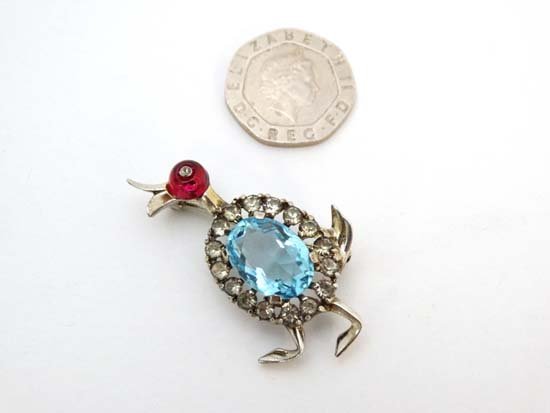 Trifari - Vintage Costume Jewellery : A Trifari: Trifari - Vintage Costume Jewellery : A Trifari Sterling brooch formed as a comical duck with red, blue and paste stone decoration 1 3/4" high £50 - 100