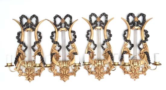 Hollywood Regency : A set of gilded carved wood Lyre: Hollywood Regency : A set of gilded carved wood Lyre shaped harps with bow and ribbon decoration each having twin branch electric wall lights. Each 22 1/2" high Please Note - we do not make reference