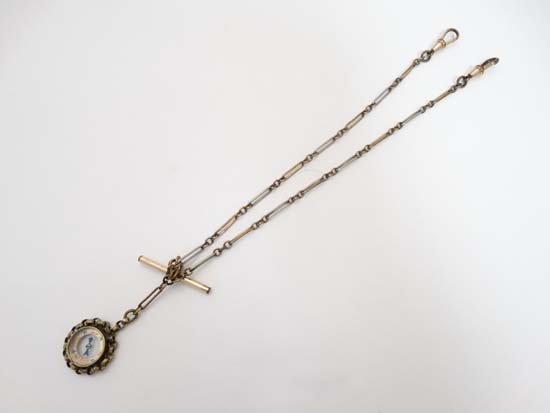 Rolled Gold Pocket Watch Chain : a double ended ( both: Rolled Gold Pocket Watch Chain : a double ended ( both with dog clip ends ) Pocket Watch chain with Compass fob, the T bar marked ' Rolled Gold ' 15 1/2" long Please Note - we do not make reference to