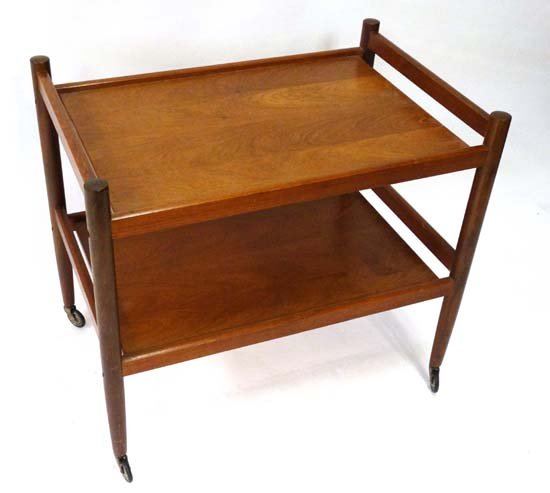 Vintage Retro : a Teak two tier trolley with turned: Vintage Retro : a Teak two tier trolley with turned slightly tapering supports and legs , 28" long