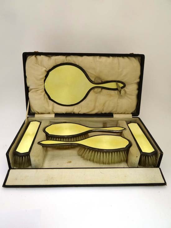 Vintage Retro : a cased set of 5 guilloche enamel: Vintage Retro : a cased set of 5 guilloche enamel dressing table brushes, to include a hand mirror, two clothes brushes and two hair brushes., the case 13 1/2" wide