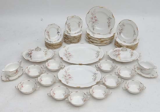 A Royal Crown Derby '' Devonshire '' bone china dinner: A Royal Crown Derby '' Devonshire '' bone china dinner service. Comprising 1 large meat plate, 1 small meat plate, 2 sauce boats and dishes, 10 dinner plates, 11 side plates, 12 saucers, 12 cake plate