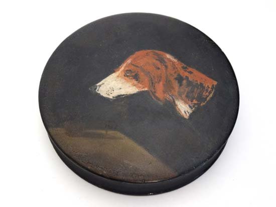 A papier-mache table snuff of cylindrical form with: A papier-mache table snuff of cylindrical form with hand painted hound head image to top. 4" diameter Please Note - we do not make reference to the condition of lots within catalogue descriptions. We 