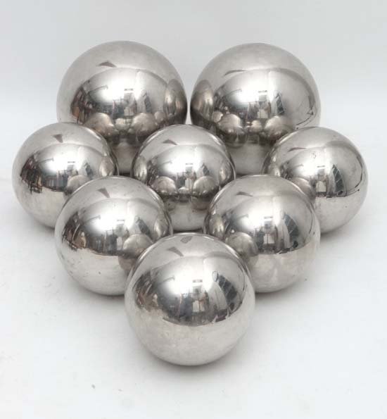 Garden and Architectural: at set of 8 ( 6+2) Stainless: Garden and Architectural: at set of 8 ( 6+2) Stainless steel spheres . Two large at approximately 12" diameter and six at 9" diameter. Please Note - we do not make reference to the condition of lots w