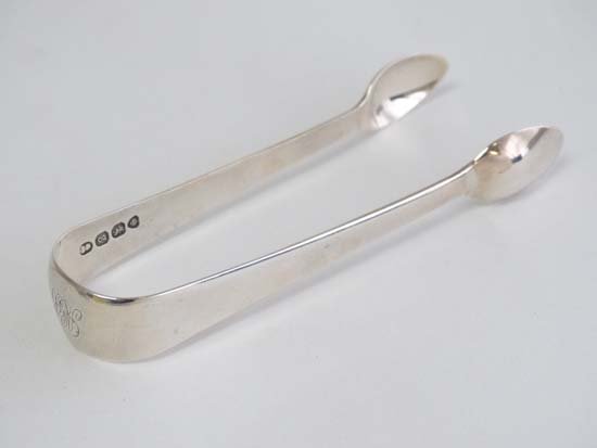 Geo IV silver sugar tongs hallmarked London 1822 maker: Geo IV silver sugar tongs hallmarked London 1822 maker Sarah & John William Blake. 4 1/2" long (28g) Please Note - we do not make reference to the condition of lots within catalogue descriptions. We a