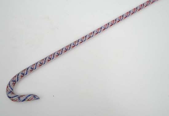 Victorian Nailsea type glass walking stick : An aqua: Victorian Nailsea type glass walking stick : An aqua glass hollow tube staff with twist decoration 57" long Please Note - we do not make reference to the condition of lots within catalogue description