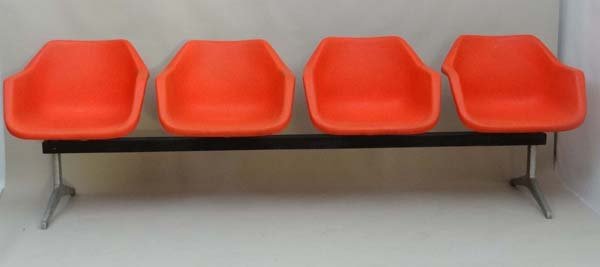 Vintage Retro :a Robin Day (1915-2010) for Hille a: Vintage Retro :a Robin Day (1915-2010) for Hille a 1960's 4 seat burnt orange Airport lounge / Waiting Room bench based on the Poly side polypropylene chairs fixed on a beam, with aluminium end feet.8