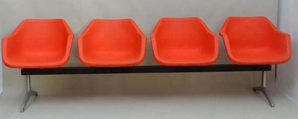 Vintage Retro : a Robin Day (1915-2010) for Hille a: Vintage Retro : a Robin Day (1915-2010) for Hille a 1960's 4 seat burnt orange Airport lounge / Waiting Room bench based on the Poly side polypropylene chairs fixed on a beam, with aluminium end feet.