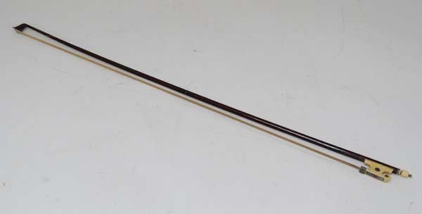 Musical Instruments : An unusual late 19th C mahogany &: Musical Instruments : An unusual late 19th C mahogany & horsehair violin bow , the mounts of ivory and ivorine with abalone inlay . Please Note - we do not make reference to the condition of lots with