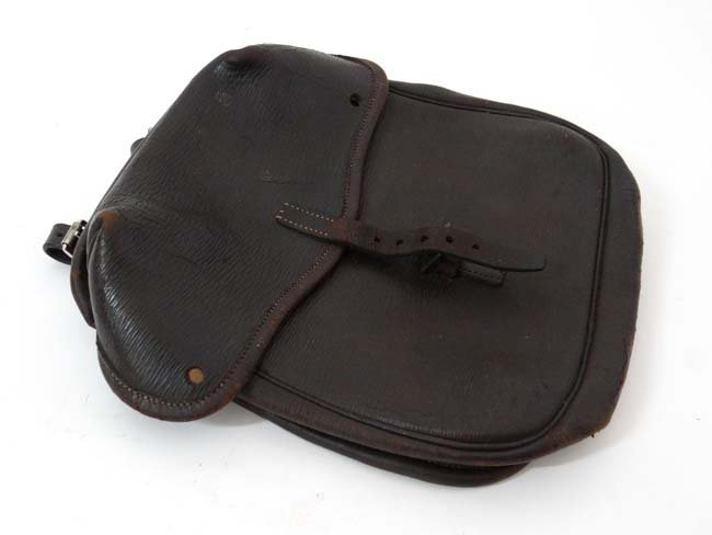 Hunting : A leather saddle bag with two strap fixings: Hunting : A leather saddle bag with two strap fixings verso and buckle catch to front. 9 3/4 x 10 1/2"