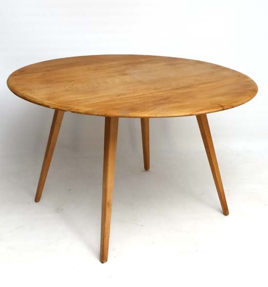 Vintage Retro : A British Ercol Windsor dining table (: Vintage Retro : A British Ercol Windsor dining table ( drop flap), no. 384 in blonde Elm and Beech