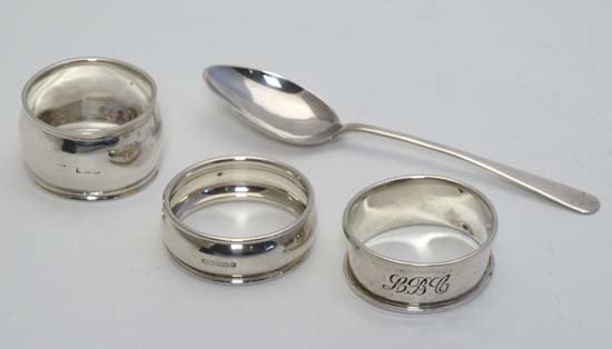 3 various Silver napkin rings together with a silver: 3 various Silver napkin rings together with a silver teaspoon. The teaspoon hallmarked Birmingham 1921 maker William Adams.(52g). (4)