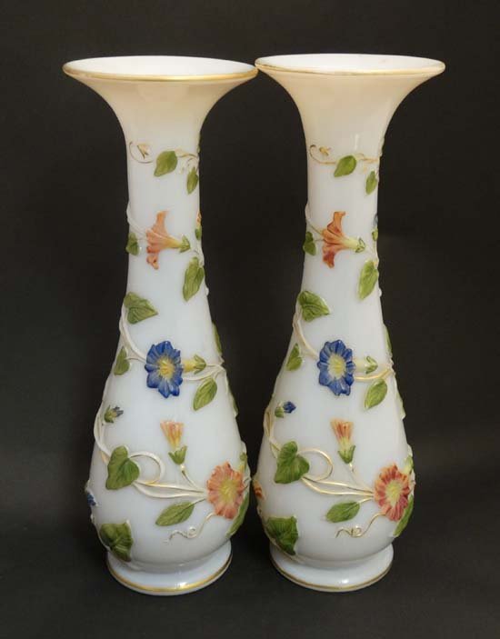 Baccarat Glass : A pair of late 19thC opaline glass: Baccarat Glass : A pair of late 19thC opaline glass vases with trailed convolvulus decoration with handle painted and gilt detail. Approx 13" high