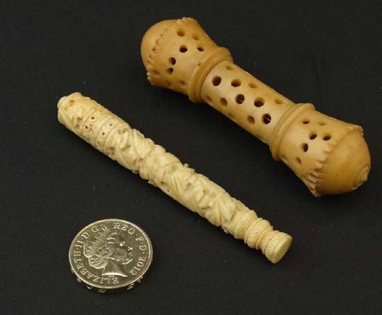 Victorian Needle cases : a 19th C Cantonese needle case: Victorian Needle cases : a 19th C Cantonese needle case with carved decoration together with a vegetable ivory pierced needle case, 3 1/8 and 3" long respectively.