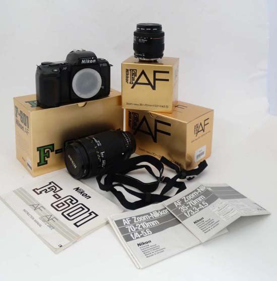 Photography : 3 boxed Nikon items ,to include Nikon: Photography : 3 boxed Nikon items ,to include Nikon F-601 AF camera , Zoom lens Nikkor 70-210mm f/4-f/5.6 and a Zoom lens Nikkoe 35-70mm f/3.3-f/4.5 (3)