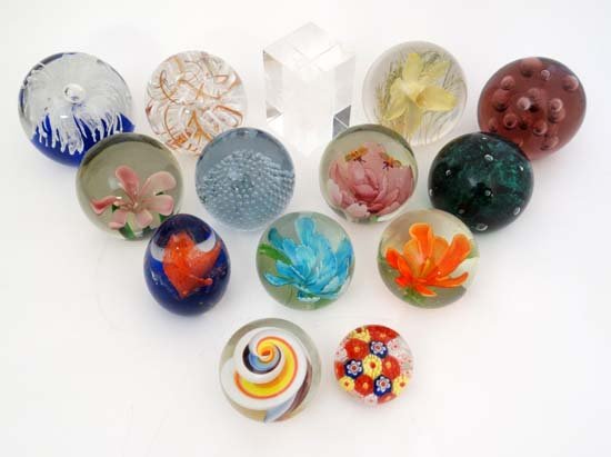 14 assorted paperweights including examples by Langham: 14 assorted paperweights including examples by Langham , Holmegaard and Highland Art . Please Note - we do not make reference to the condition of lots within catalogue descriptions. We are however hap