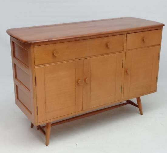Vintage Retro : a British Blonde Elm and Beech Ercol: Vintage Retro : a British Blonde Elm and Beech Ercol Windsor Sideboard ( short ) no. 726 with turned and shaped short legs and stretcher. 48" Wide £60 - 80