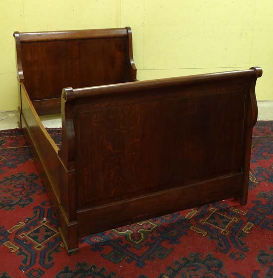 A c.1900 French single sleigh bed 45" wide overall,: A c.1900 French single sleigh bed 45" wide overall, together with an associated shaped canopy