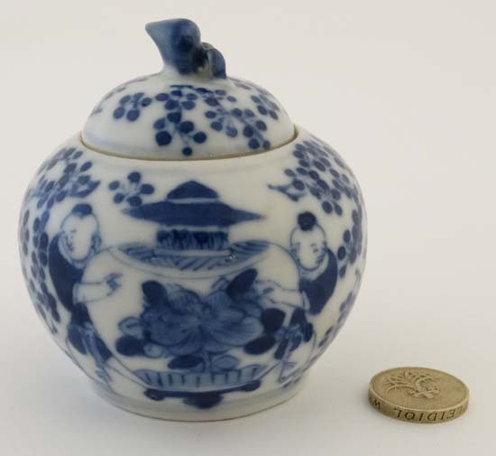 A small Chinese style blue and white lidded pot, (1 of 5)