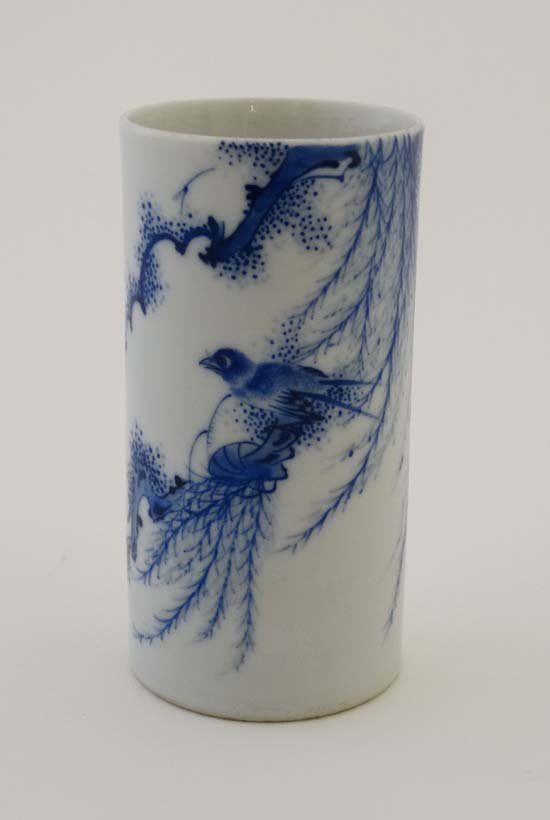 A small Chinese blue and white cylindrical porcelain (1 of 4)